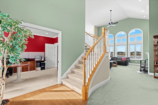 10587 Lighthouse, South Lyon, MI 48178 - stairs featuring carpet floors, high vaulted ceiling, a ceiling fan, baseboards, and recessed lighting