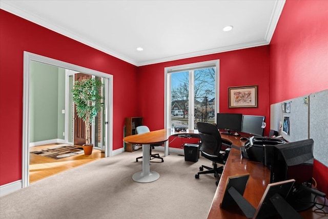 home office with crown molding and carpet floors