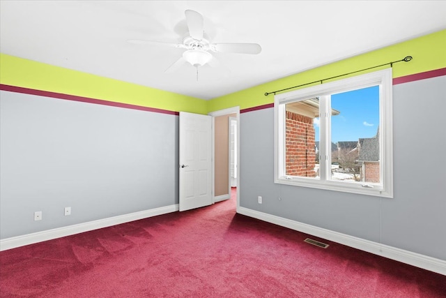 10587 Lighthouse, South Lyon, MI 48178 - unfurnished room featuring carpet flooring, baseboards, and a ceiling fan