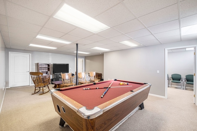 playroom featuring carpet floors and a drop ceiling