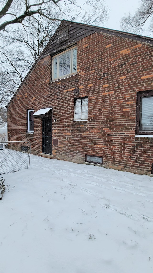 view of snow covered property