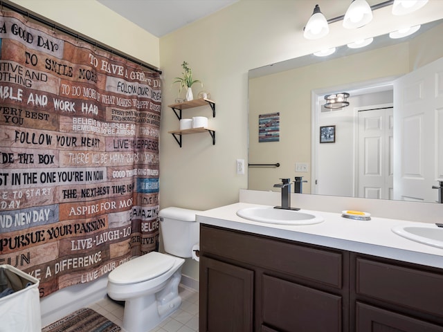 full bathroom with tile patterned flooring, vanity, shower / tub combo, and toilet