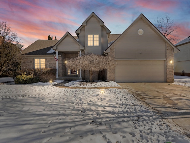 front of property with a garage