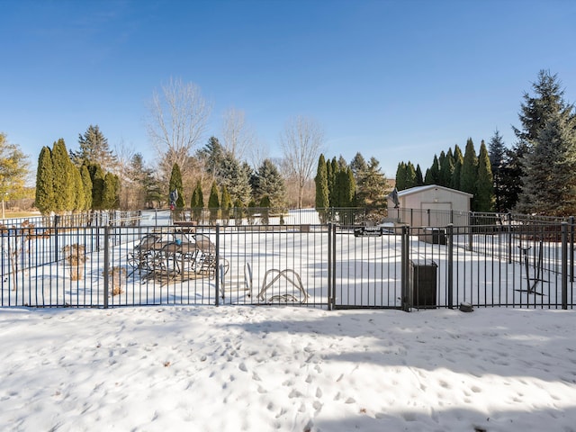 view of snow covered gate