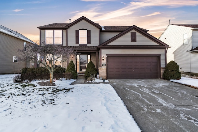 front of property with a garage