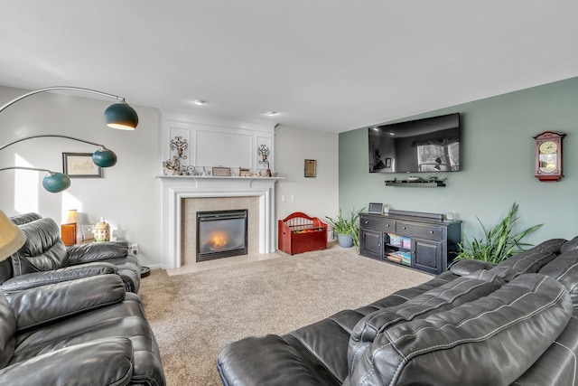 living room featuring a fireplace and carpet