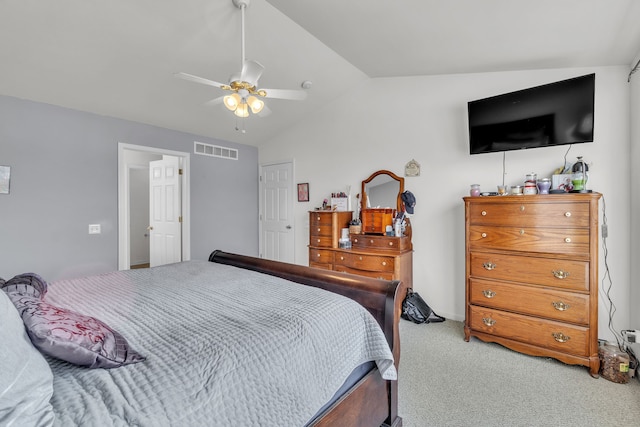 bedroom with vaulted ceiling, ceiling fan, and carpet