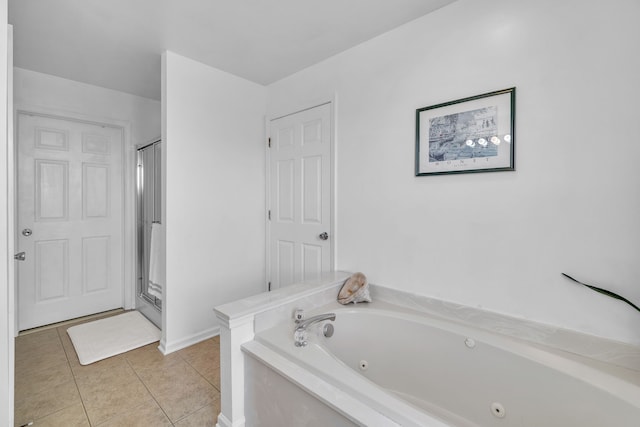 bathroom featuring separate shower and tub and tile patterned floors