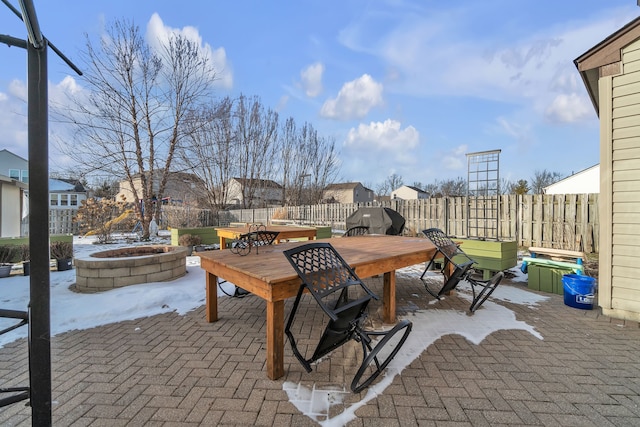 view of patio with grilling area and an outdoor fire pit