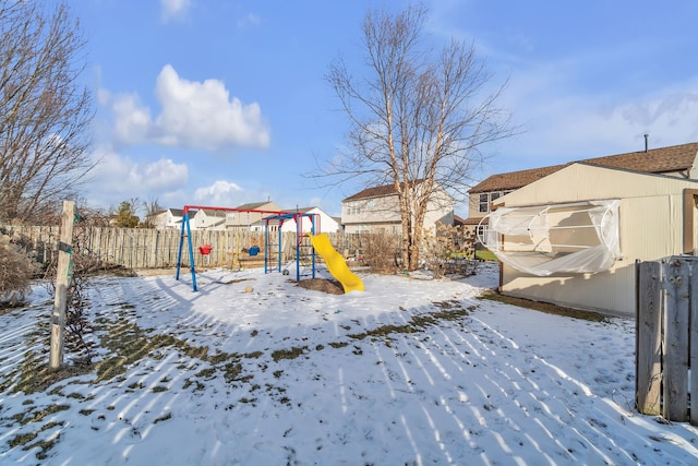 view of snow covered playground