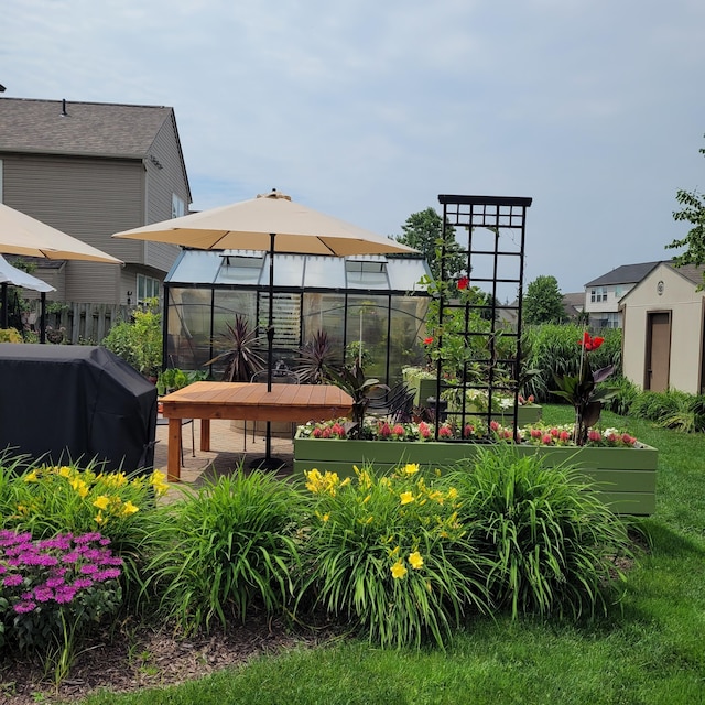 view of community featuring a storage shed