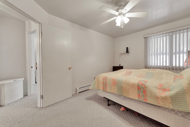 bedroom featuring light colored carpet, ceiling fan, and baseboard heating