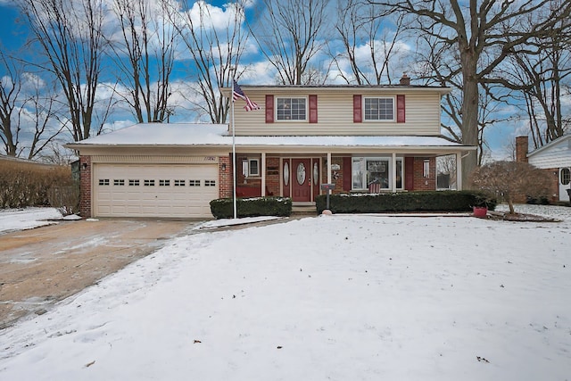 view of front of property with a garage