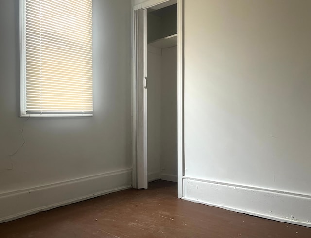 unfurnished bedroom with a closet