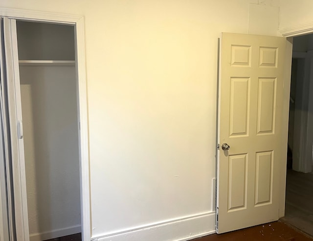 unfurnished bedroom featuring a closet