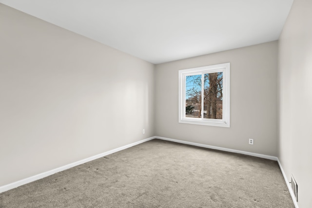 empty room featuring carpet