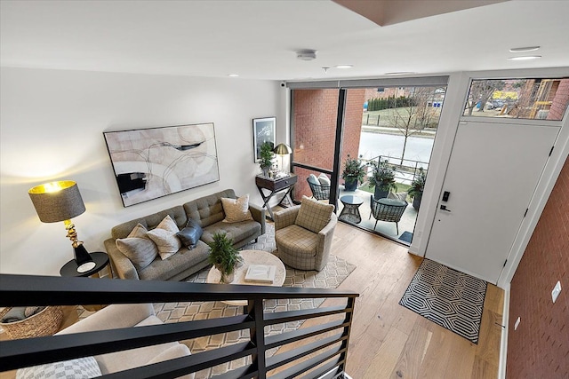 living room with light hardwood / wood-style flooring