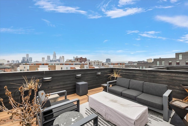 view of patio featuring a balcony and an outdoor hangout area