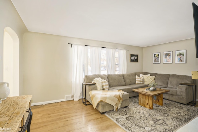 living room featuring light wood-type flooring