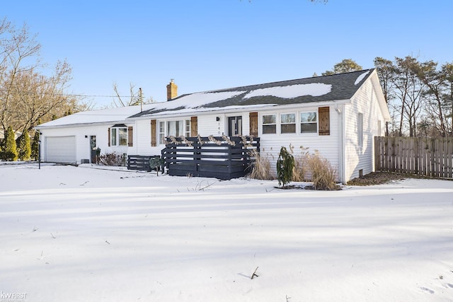 ranch-style home with a garage