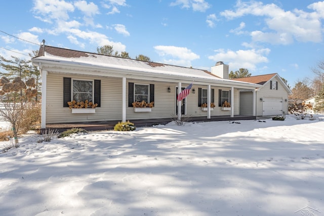 view of front of house featuring a garage and covered porch