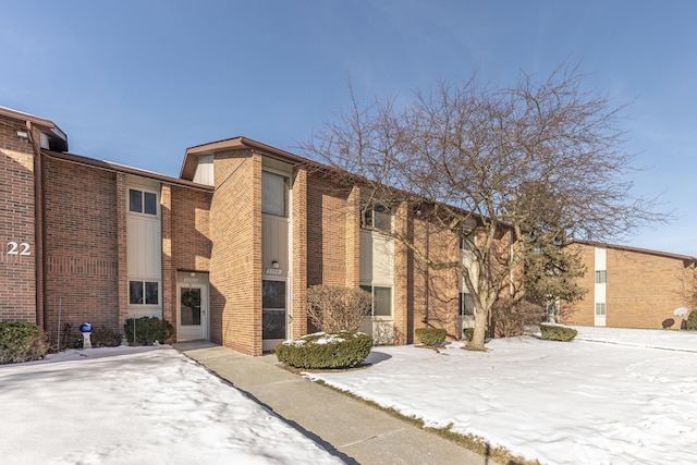 view of snow covered building