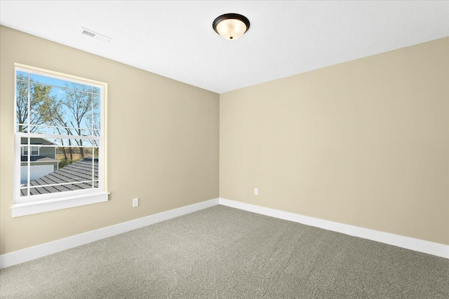 empty room with carpet floors