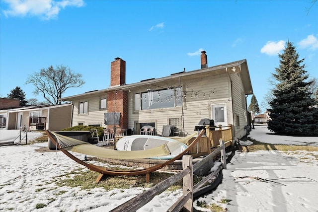 view of snow covered property