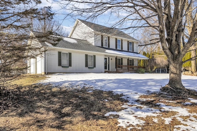 view of property featuring covered porch