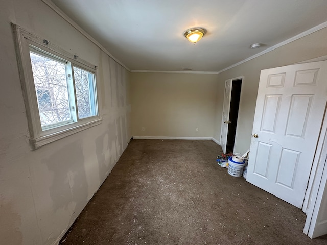 unfurnished room featuring ornamental molding