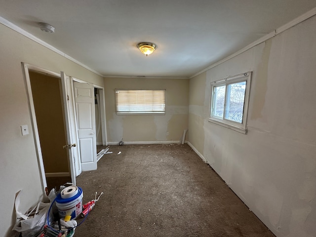 unfurnished bedroom featuring ornamental molding