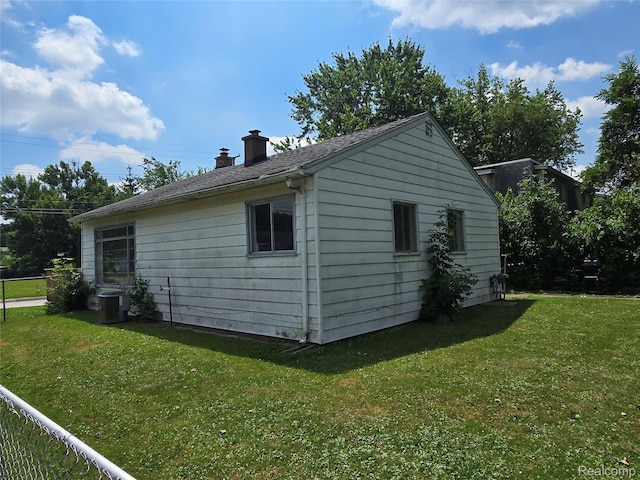 32004 Cheboygan, Westland, MI 48186 - view of side of home with a chimney