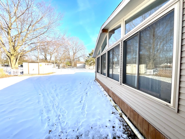 view of yard covered in snow