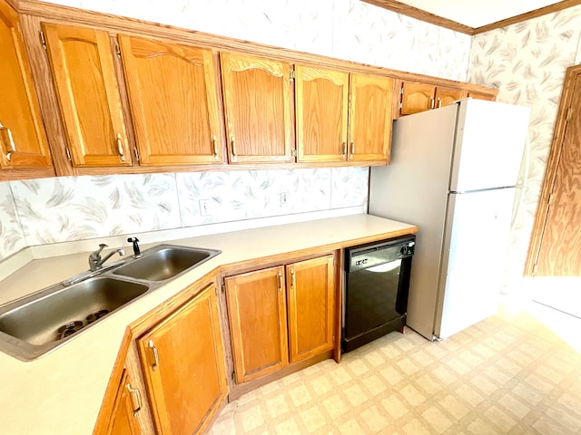 kitchen with sink, dishwasher, and white fridge