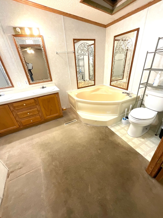 bathroom featuring ornamental molding, a bathtub, and vanity