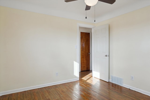 unfurnished room featuring ceiling fan and hardwood / wood-style floors