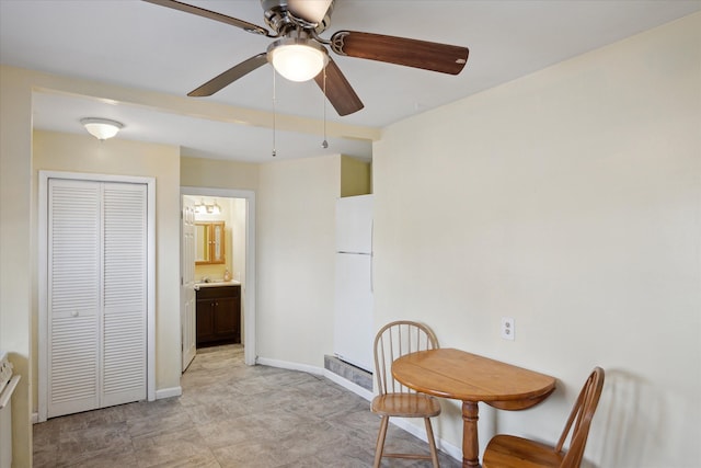 dining area with ceiling fan