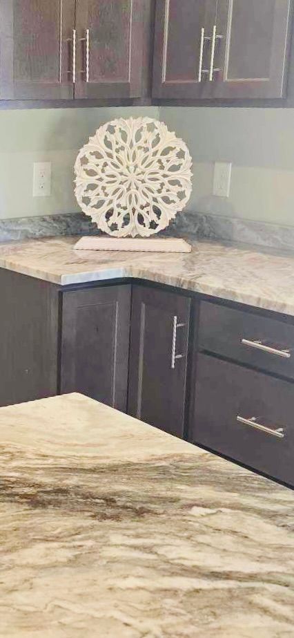 kitchen with dark brown cabinetry