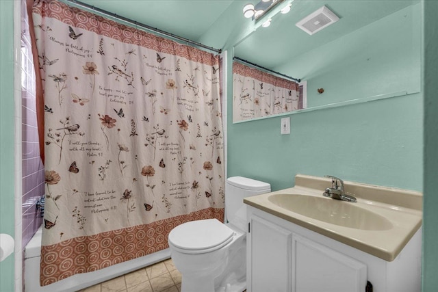 full bathroom with tile patterned floors, vanity, toilet, and shower / bath combo