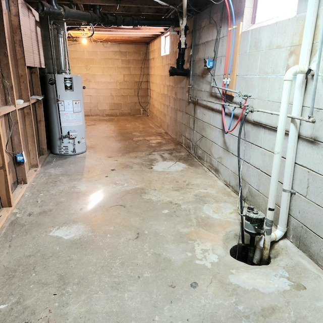 unfinished below grade area featuring gas water heater