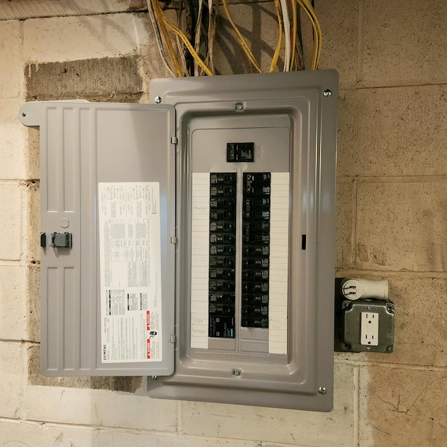 utility room featuring electric panel