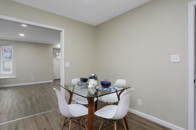 dining space featuring hardwood / wood-style floors