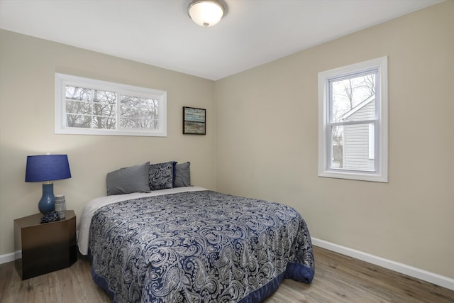 bedroom with wood-type flooring