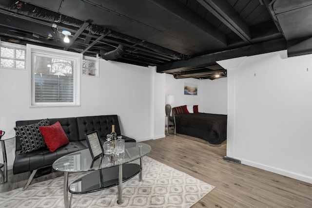 living room with light hardwood / wood-style flooring