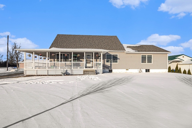 view of front of property featuring covered porch