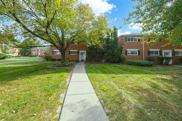 view of front of property with a front lawn