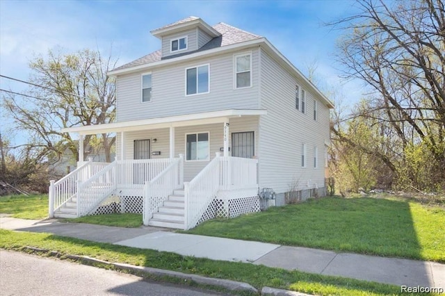 view of front of house with a porch and a front yard