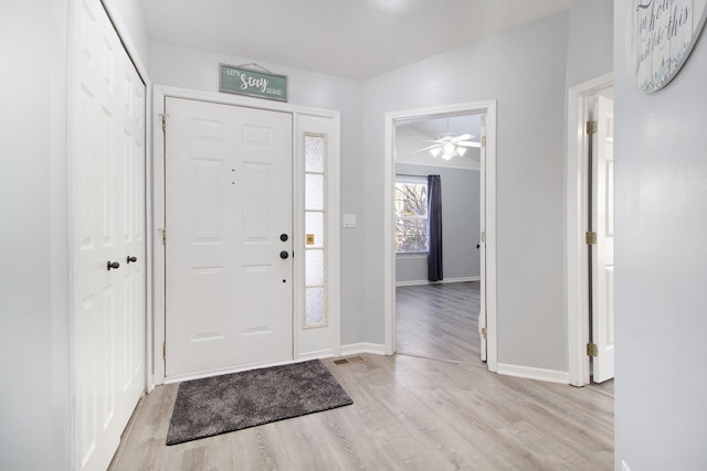 foyer entrance featuring light wood-type flooring