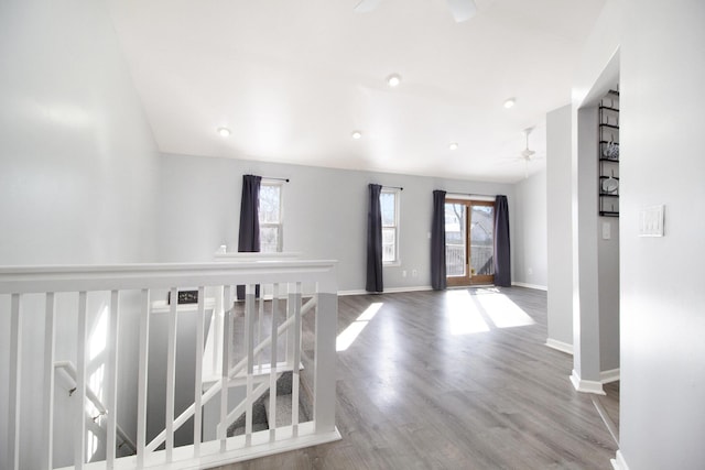 corridor featuring hardwood / wood-style floors