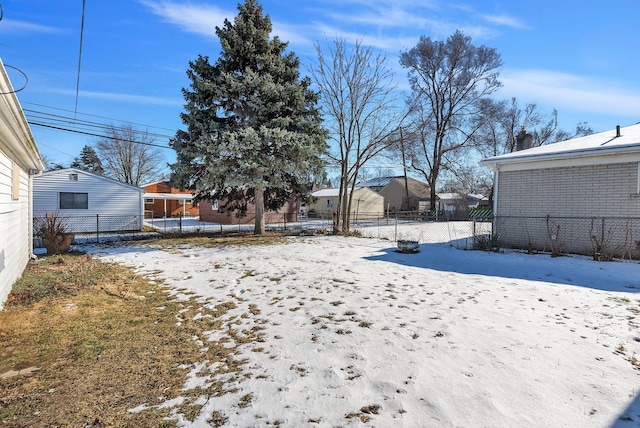 view of yard covered in snow